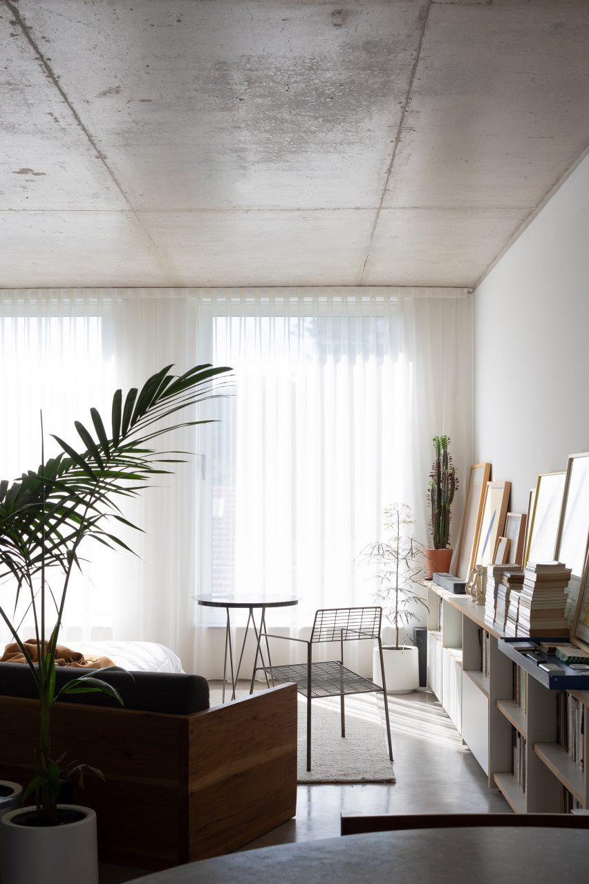 Concrete living room at Virrey Aviles Street apartments by Juan Campanini and Josefina Sposito