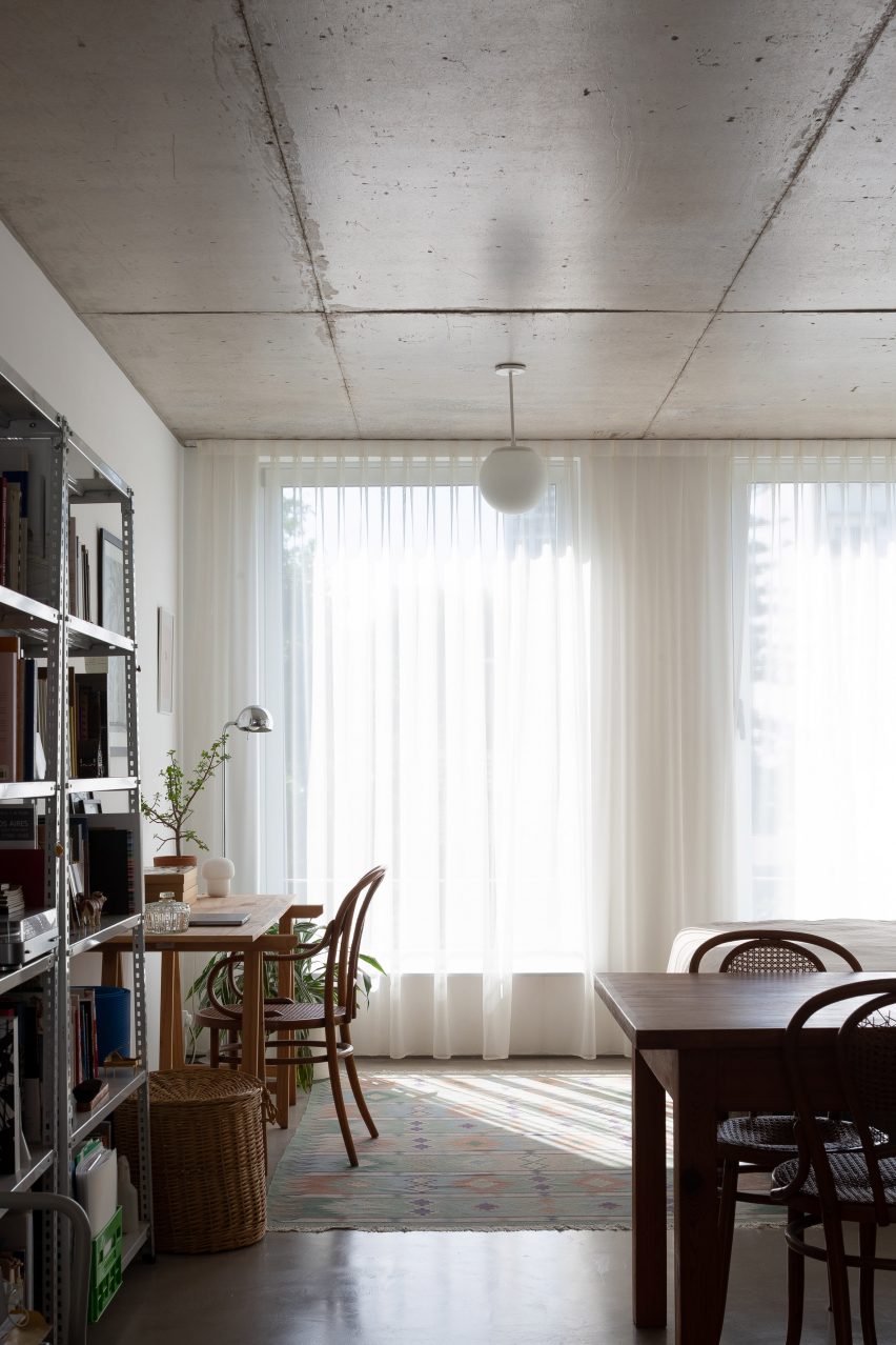 Concrete living room at Virrey Aviles Street apartments by Juan Campanini and Josefina Sposito