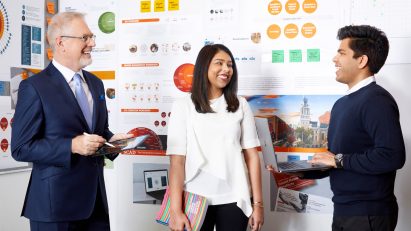 SCAD students presenting their works to a professor