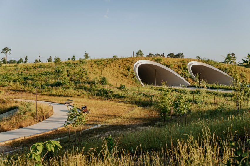 Two tunnels with a mound of earth on top
