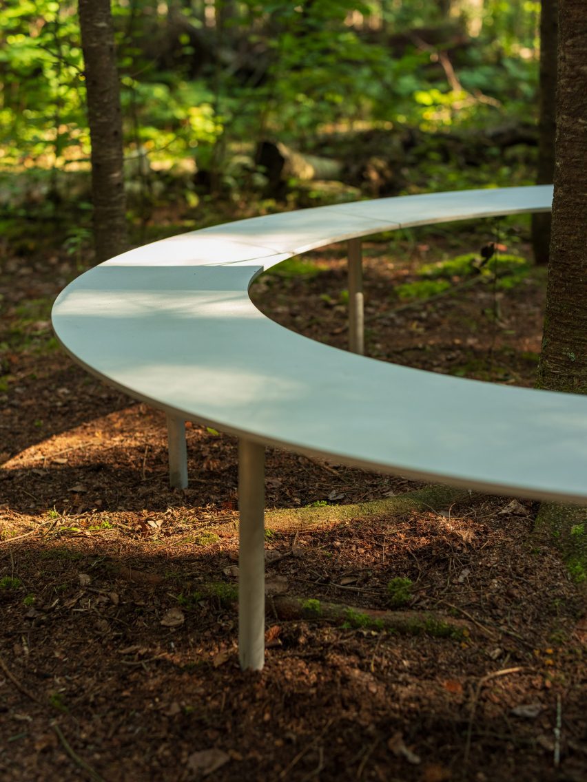 A metal, circular bench