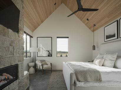 Limestone fireplace by The Ranch Mine