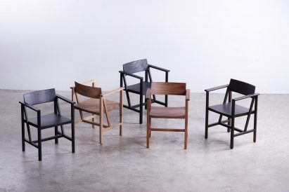 Wooden chairs on concrete floor