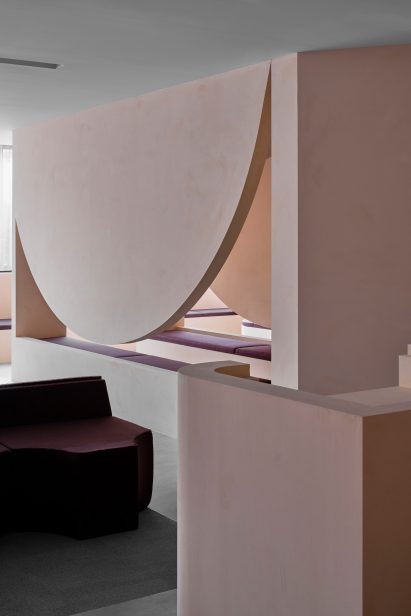Pink plaster walls with geometric cutouts