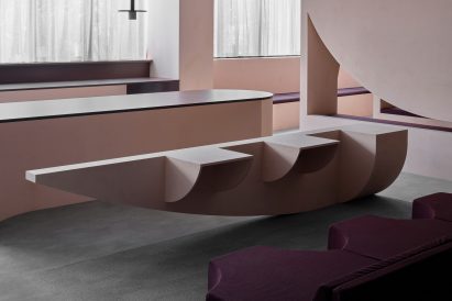 Sculptural pink-plaster bench 