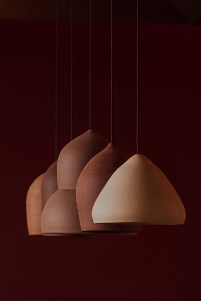 Ceramic lamps inside The Taproom bar at Tenczynek Brewery by Projekt Praga