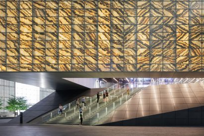 Cantilevered Perelman Center entrance with glowing marble