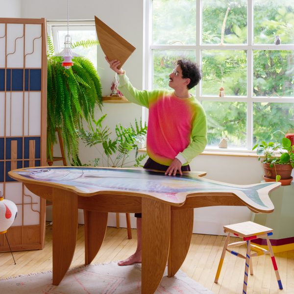 Rio Kobayashi at home with works from his exhibition