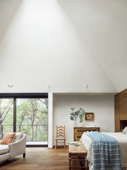 Bedroom at River Bend Residence by Lake Flato Architects