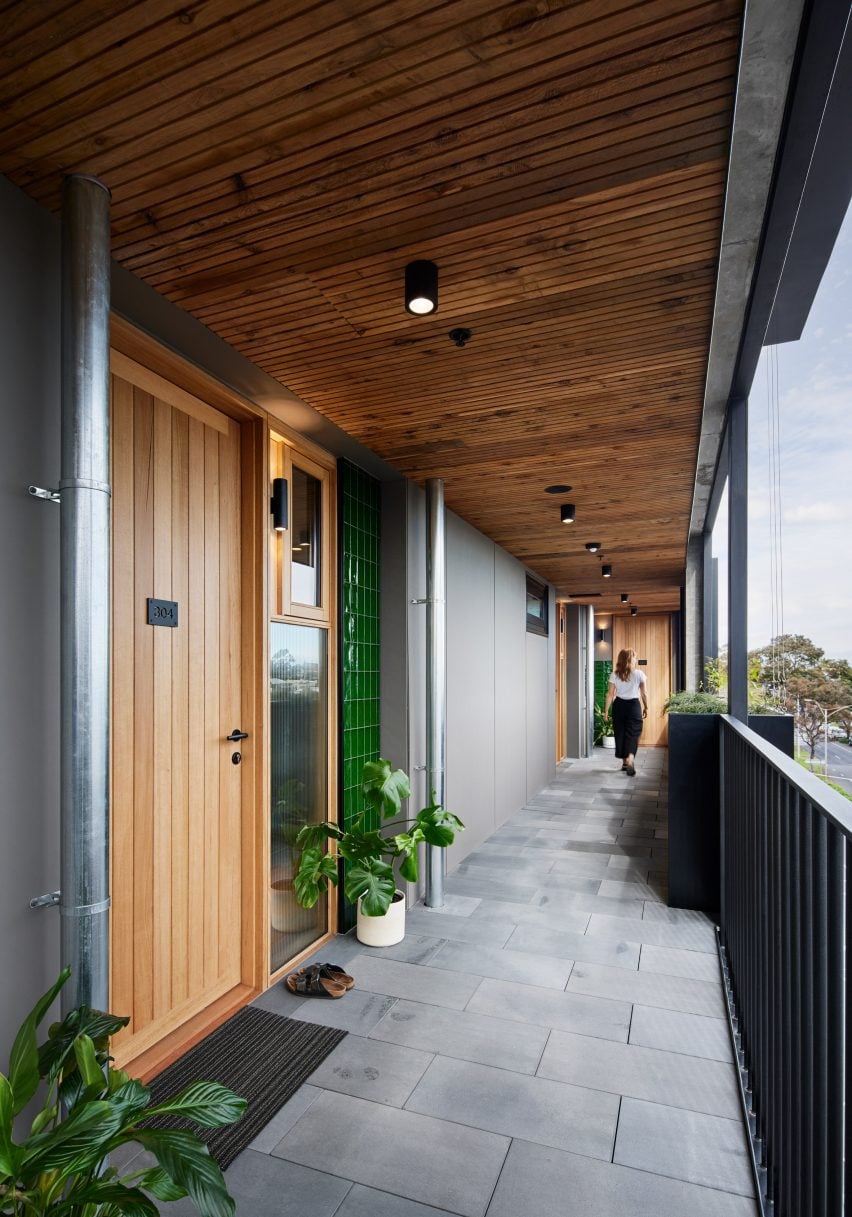 External apartment corridor with wood doors