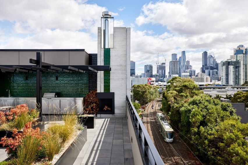 Rooftop terrace next to a railway