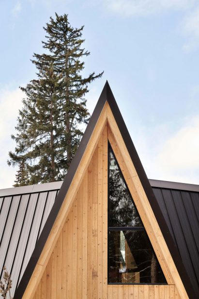 Gable of wooden A-frame cabin in Colorado