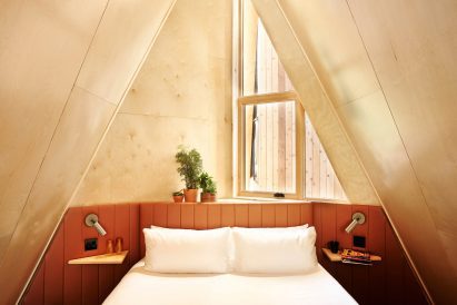 A-frame lofted bed with window