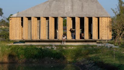 Bamboo artist's studio by a lake by 11.29 Studio