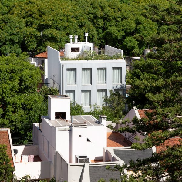 Aluminium Virrey Aviles Street apartment surrounded by lush greenery by Juan Campanini and Josefina Sposito
