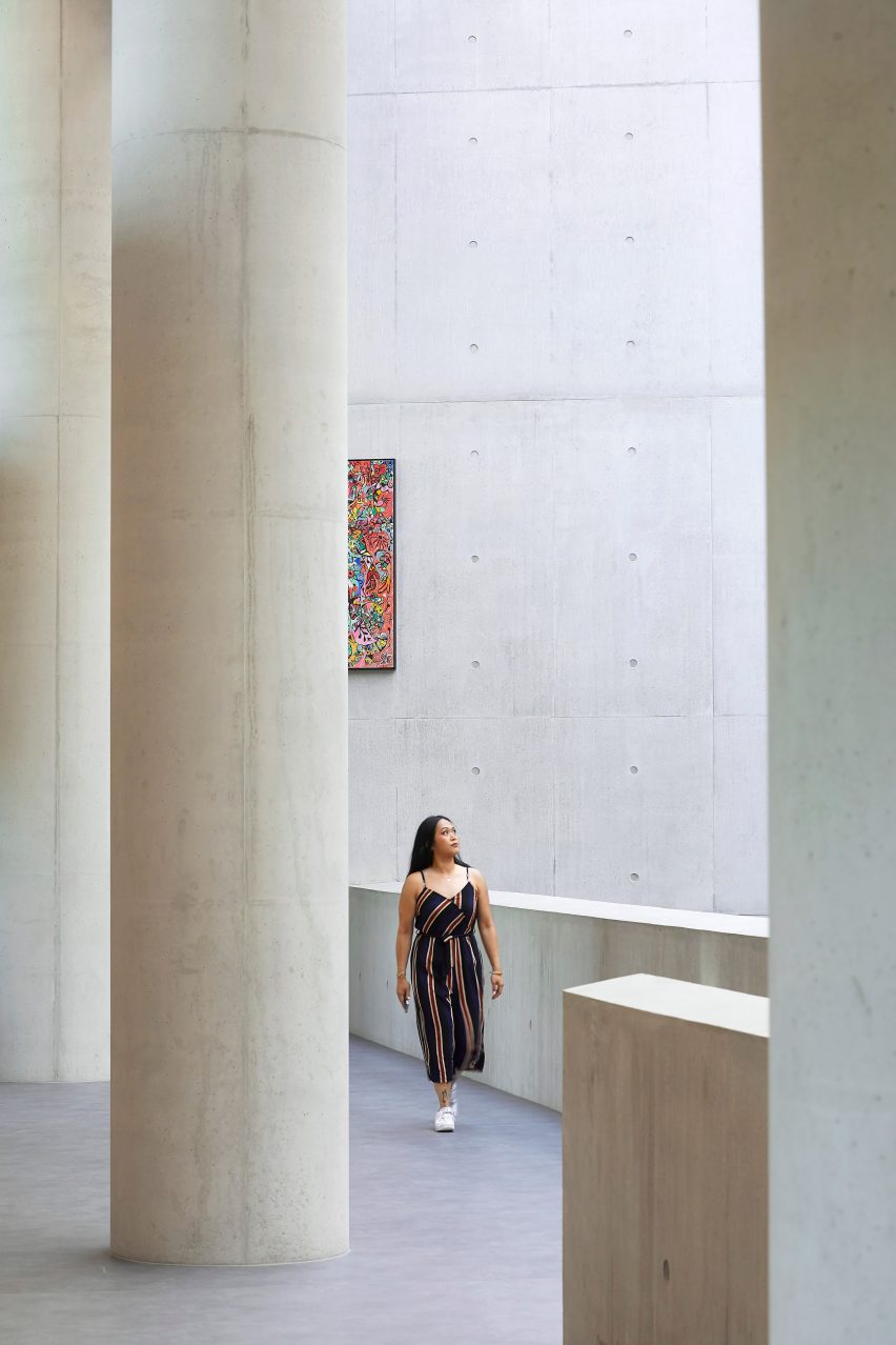 Lofty concrete interior with large circular concrete columns
