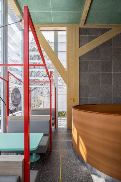 Interior seating at the mass timber McDonald's in Sao Paulo