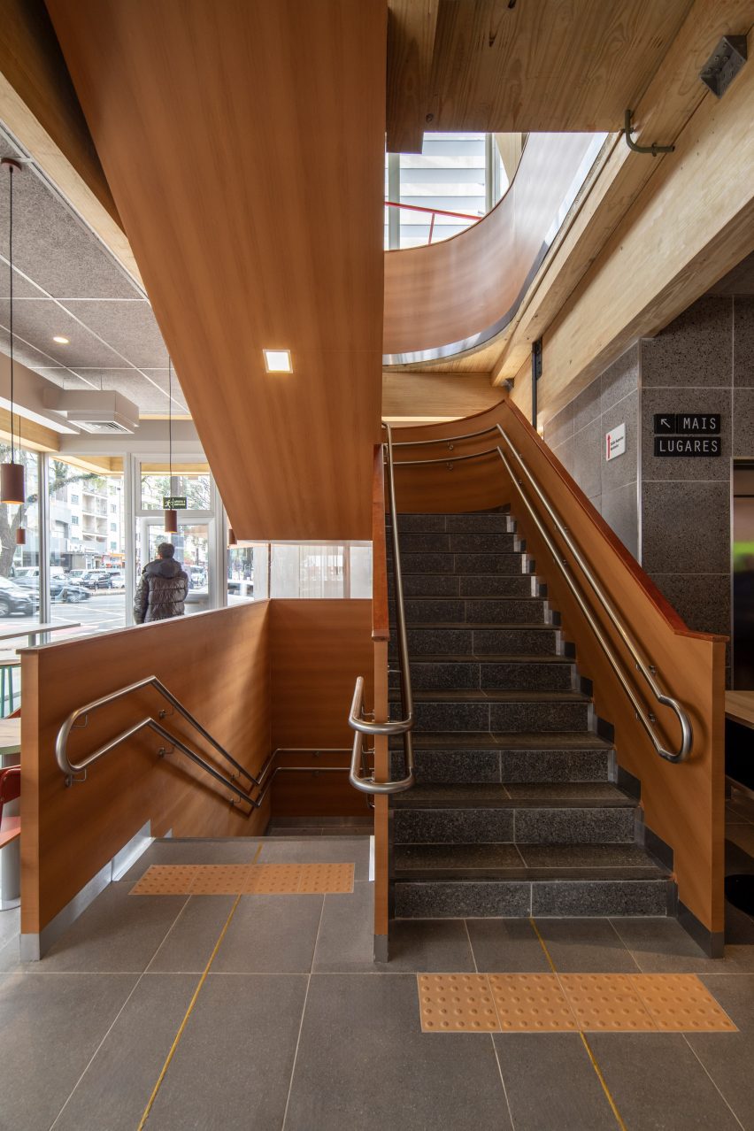 Wooden staircase at the Sao Paulo McDonald's by Superlimao