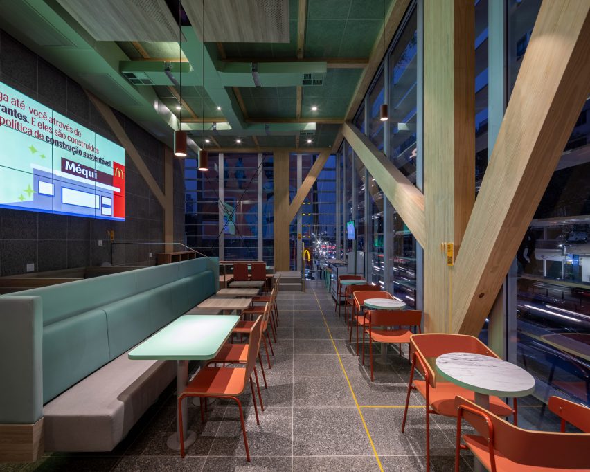 Mass timber columns and seating at the McDonald's in Sao Paulo