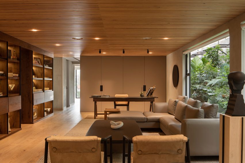 Open plan living room with timber finishes