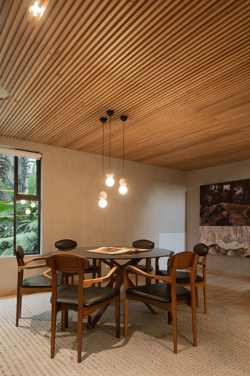 Dining room interior with timber ceiling