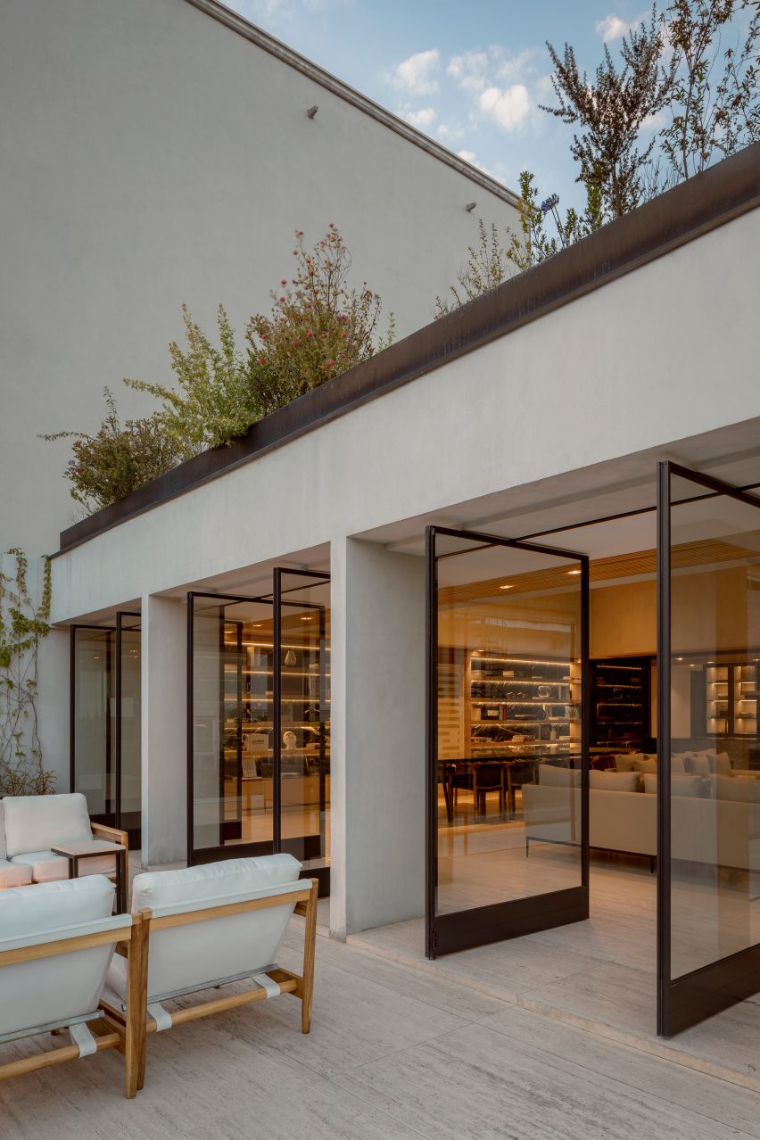 Double doors opening onto an outdoor terrace