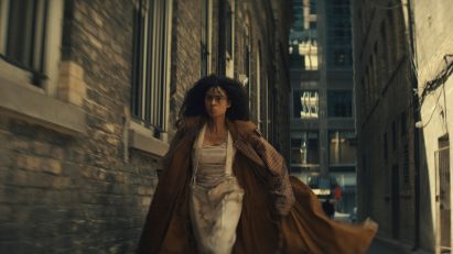 Actor wearing a voluminous coat