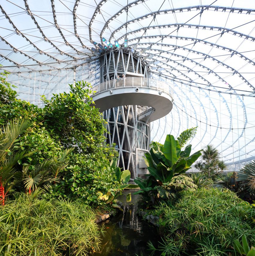 A greenhouse with four different biomes contained underneath a spiraling roof