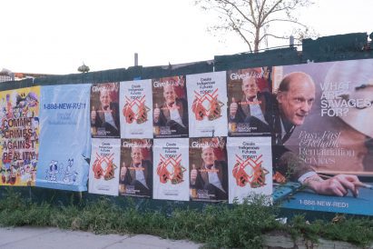 Posters on a construction wall