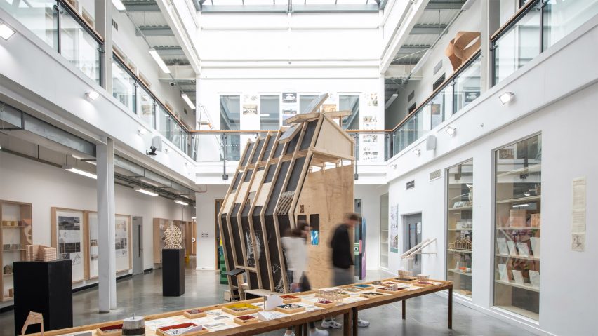 a photograph of a large architectural model in a hall