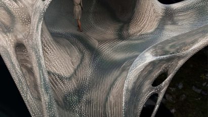 Softbiome's digital visual of a female standing in a cave of an organic shape