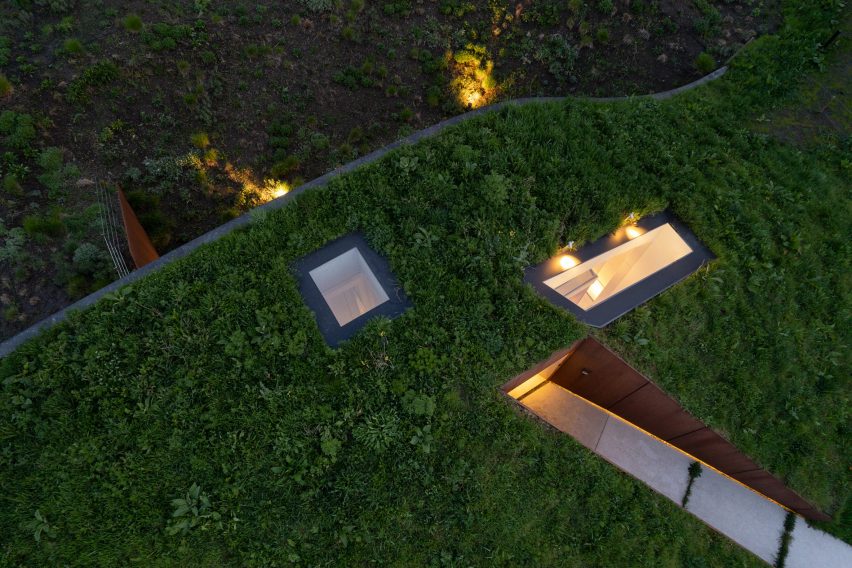 Top view of the grassy roof at The Under The Ground House by WillemsenU