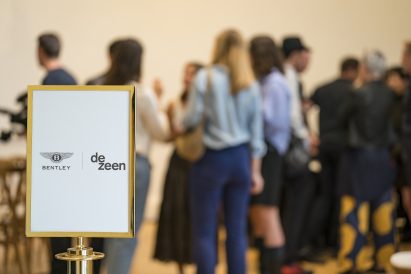 Dezeen and Bentley's logos displayed on a sign during the talk