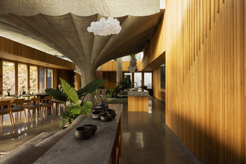 Kitchen in house with massive concrete pillar