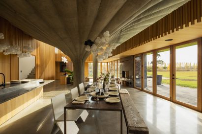 Kitchen in house with massive concrete pillar