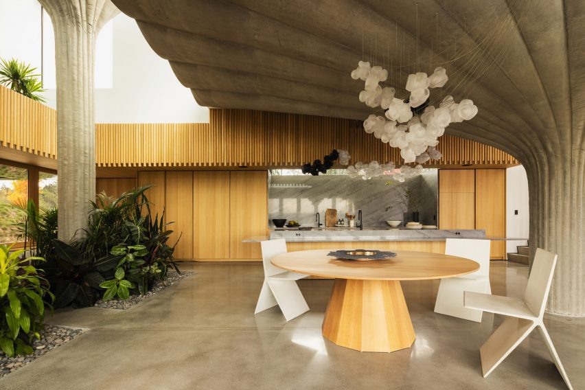 Kitchen in house with massive concrete pillar