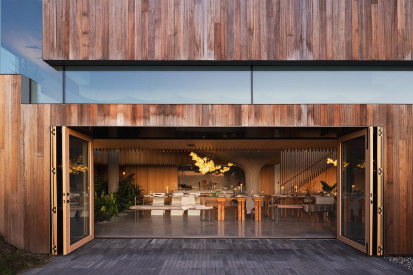 Sliding glass doors that open onto a kitchen
