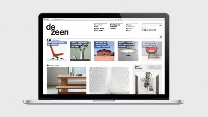 Dezeen website on laptop