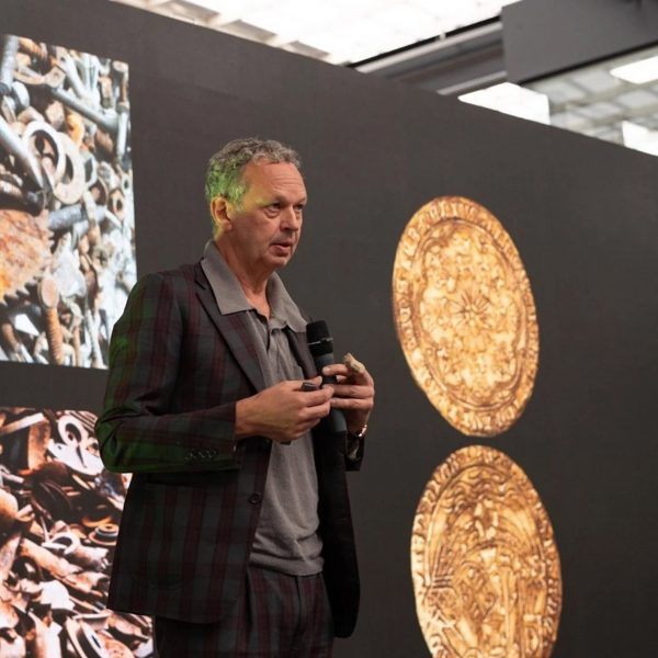 Tom Dixon speaking at an event