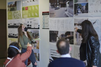 The Tyler School of Art and Architecture at Temple University students looking at a work board