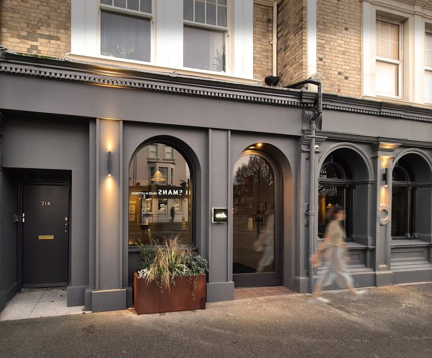 Two full height modern arches added to the existing three heritage ones