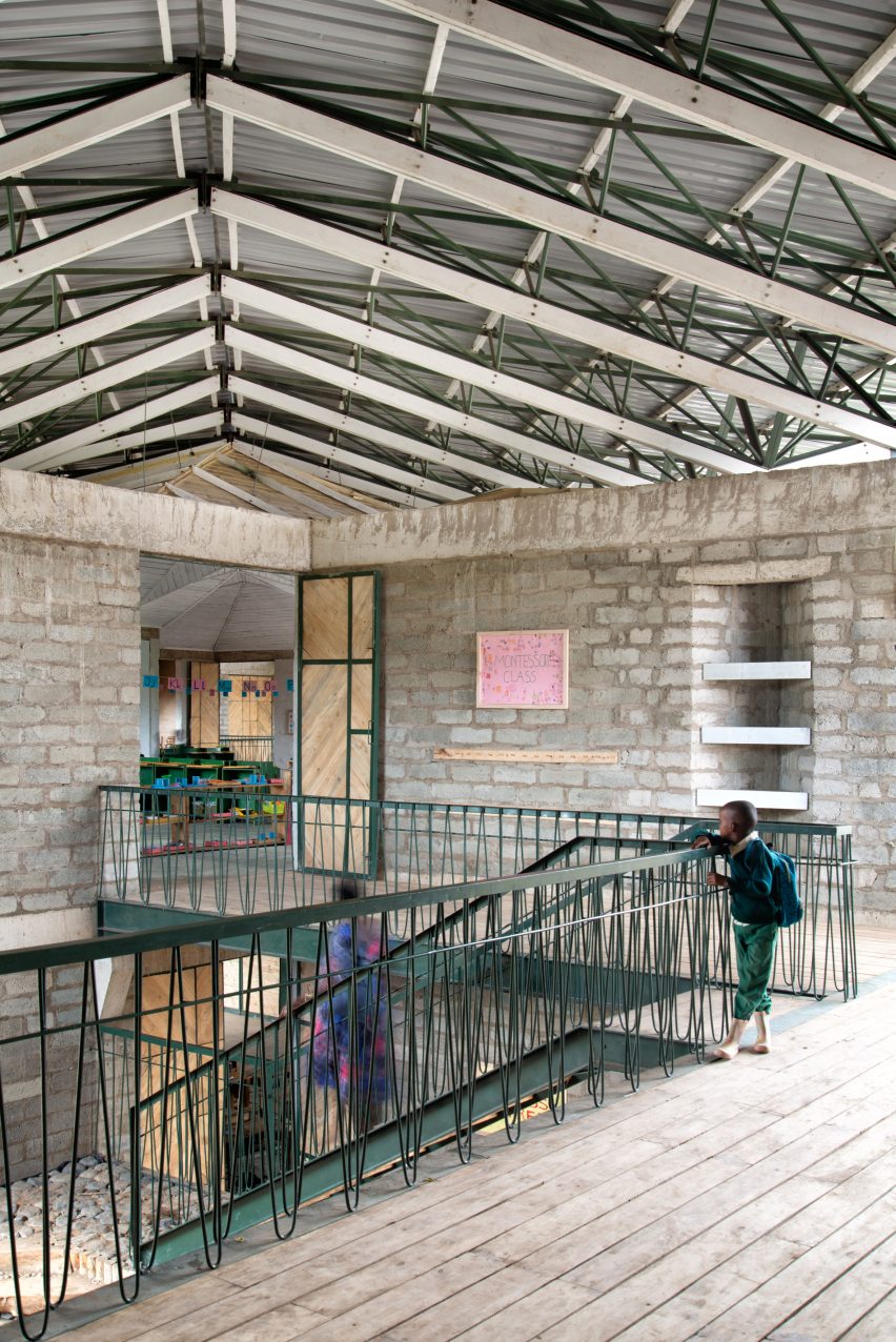 Top of a metal staircase at Simba Vision Montessori School in Tanzania by Architectural Pioneering Consultants