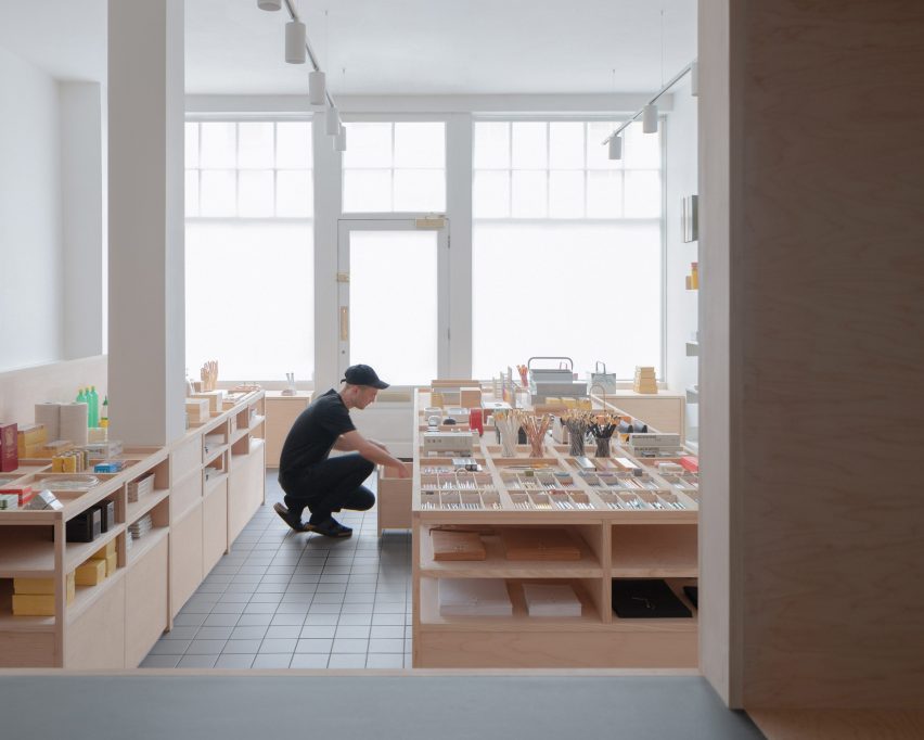 Wooden shelving in London stationery store