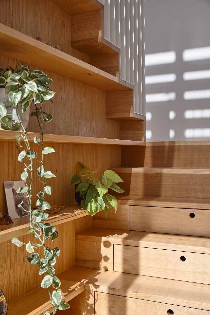 Staircase with inbuilt storage inside house by Austin Maynard Architects