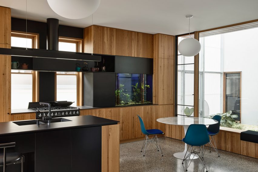 Fish tank built into kitchen of Fitzroy house