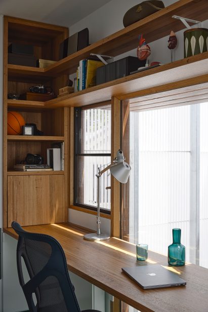 Study space overlooking fish pond in Helvetia house