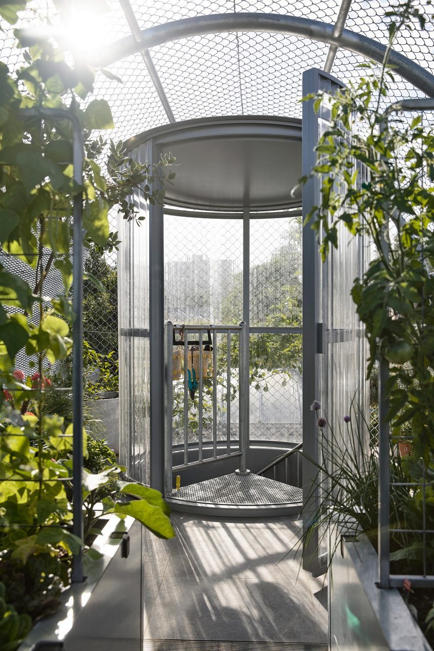 Round doorway entrance to productive rooftop garden in Fitzroy