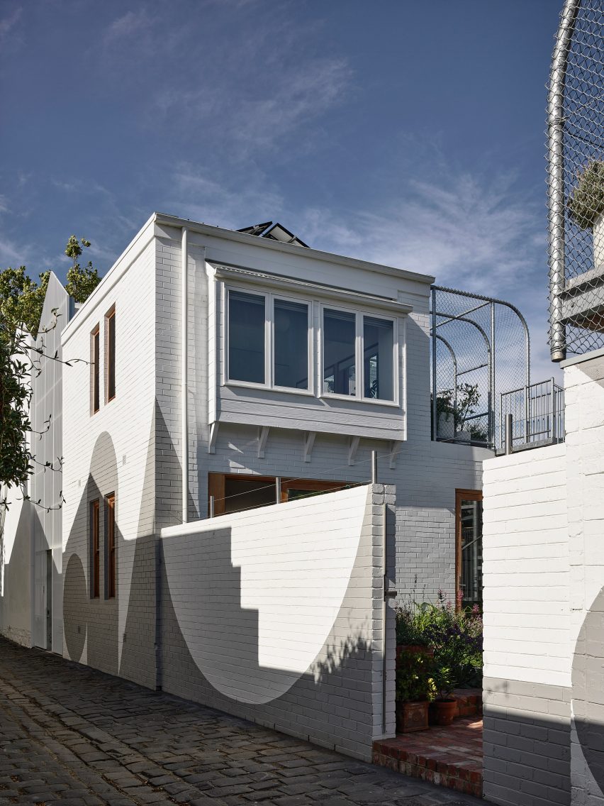 Brick wall and exterior shot of house in Melbourne by Austin Maynard Architects
