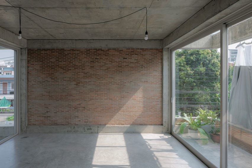 Exposed brick and conrete in House K by Bangkok Tokyo Architecture
