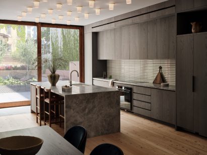 A kitchen with a gray colour palatte